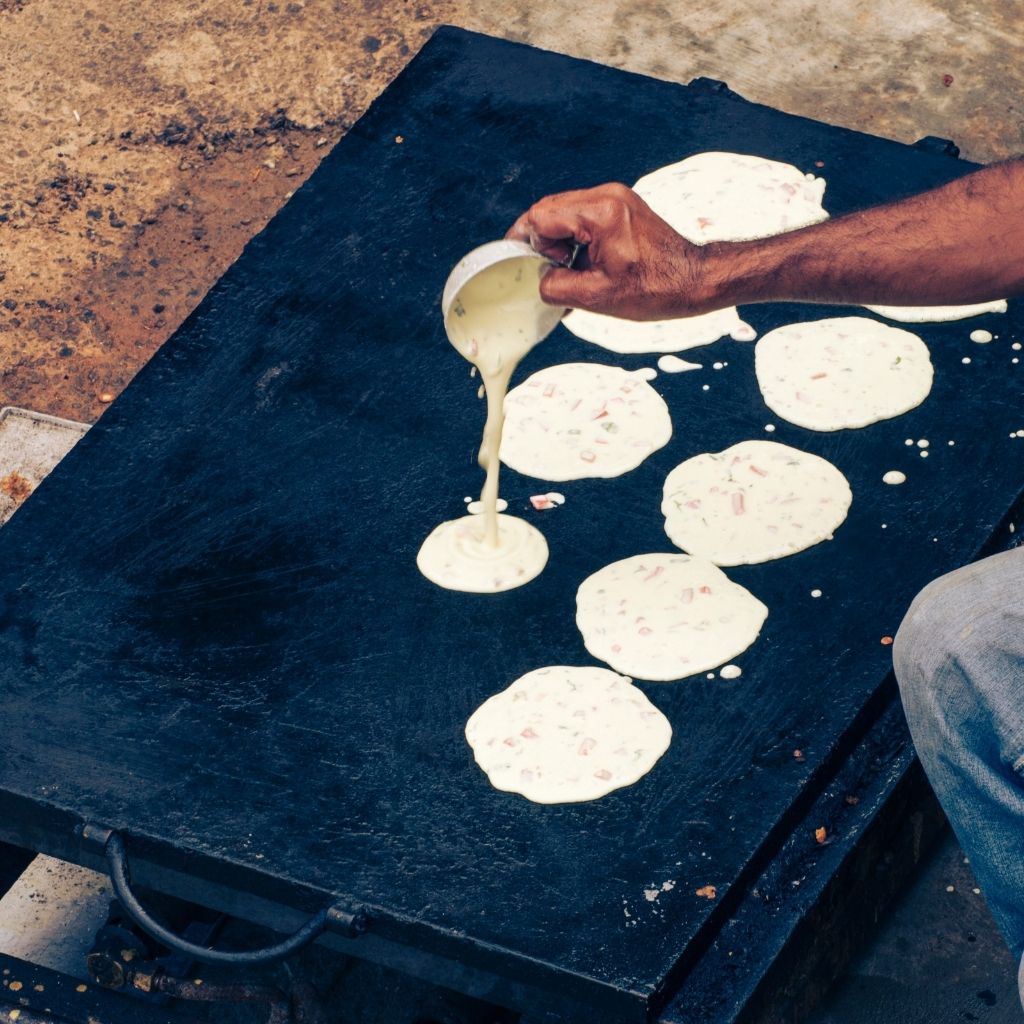 Trying different foods and learning how to cook them