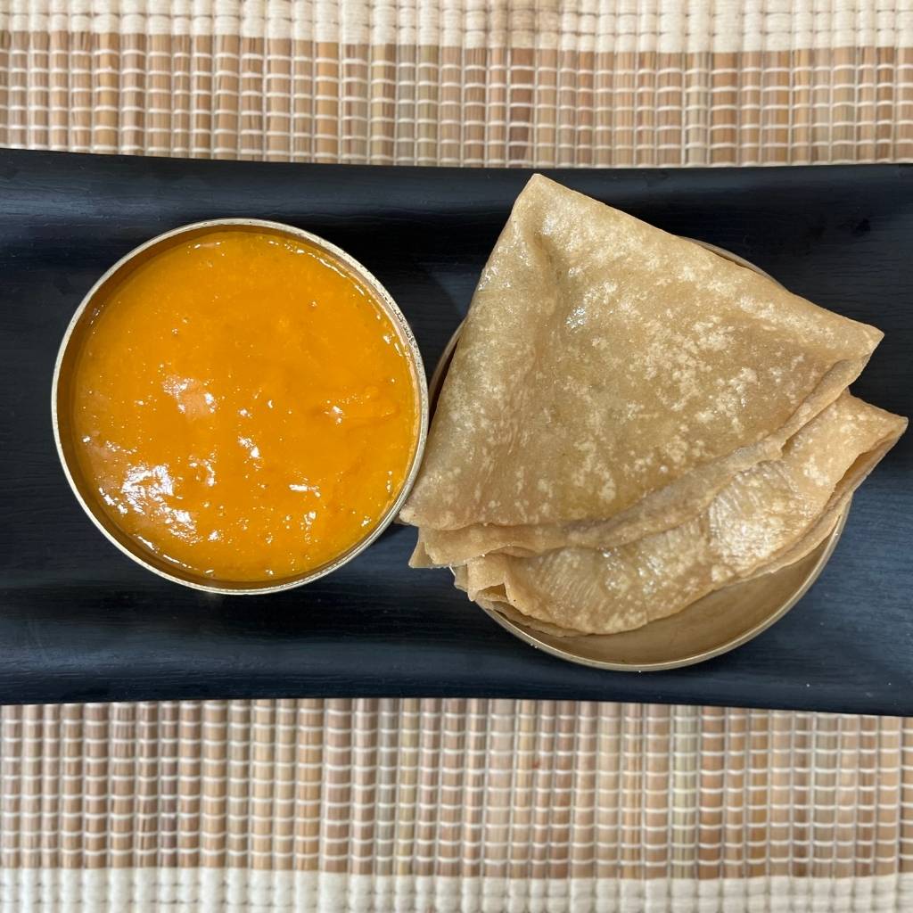 Gujarati food dish - aamras- mango