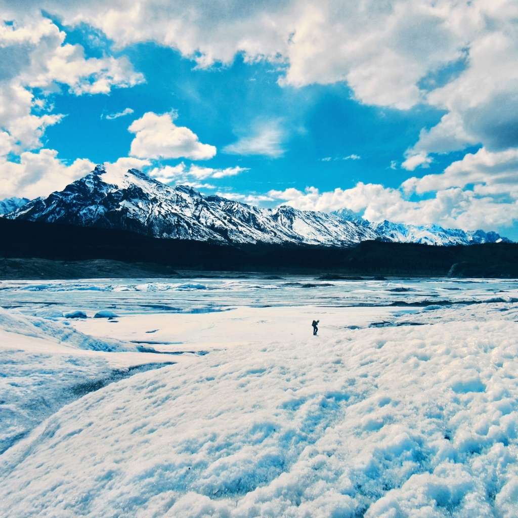 A solo hiker in the beautiful surrounding of Matanuska Glacier in Alaska