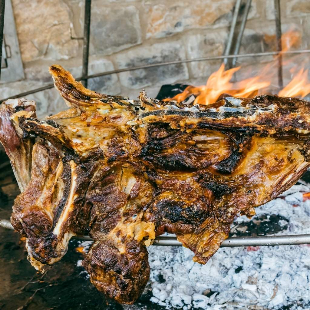 The antikristo is a traditional Cretan method of roasting meat over an open fire