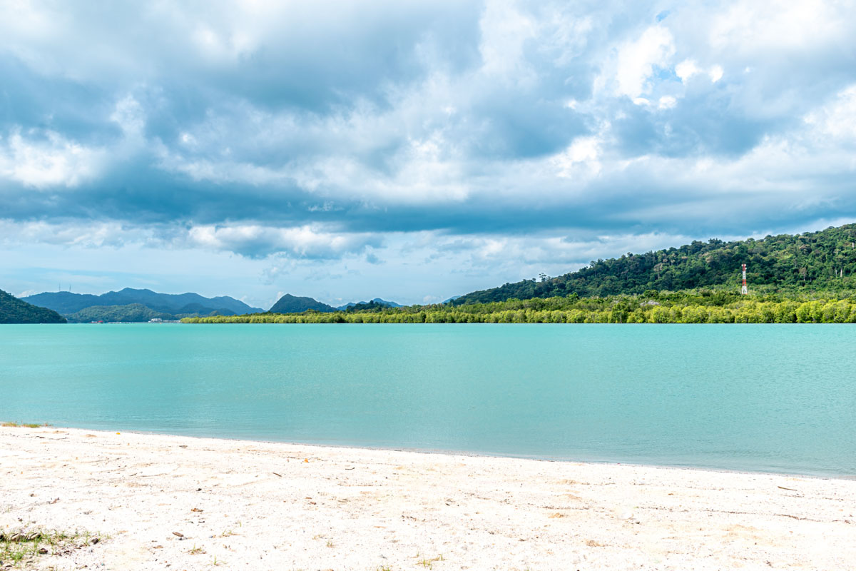 A beautiful white sand beach and tranquil waters on Dayang Bunting Island