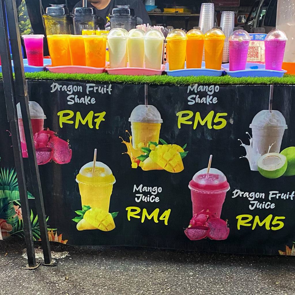 Fresh fruit milkshakes and juices in Langkawi night markets offer a vibrant array of flavors and colors