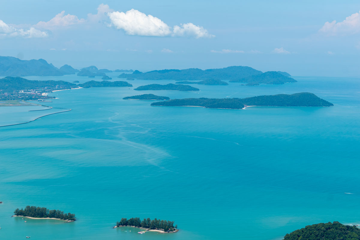 A breathtaking view of various islands surrounded by turquoise water of the Andaman Sea