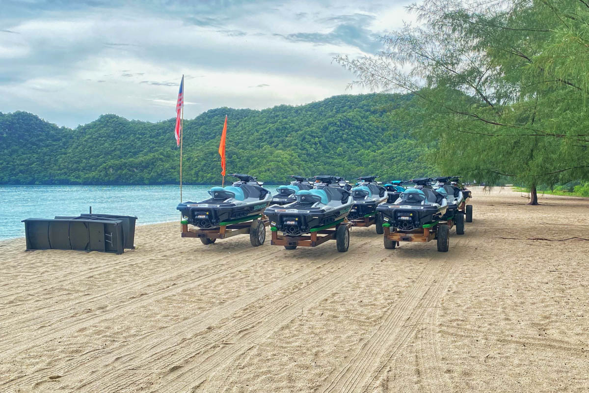 Jet Skis lined up along the shores of Tanjung Rhu beach, ready to take adventure seekers on thrilling rides