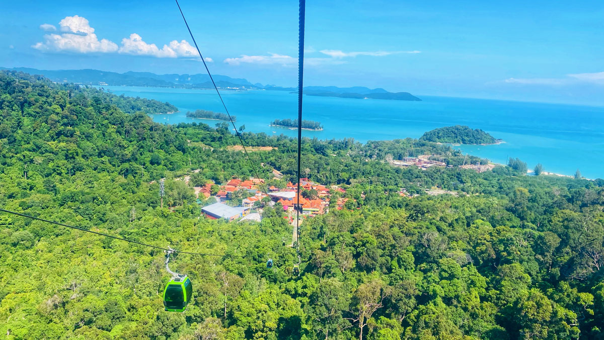 Panoramic view of the rainforest and Andaman sea from the Gondola of SkyCab Langkawi