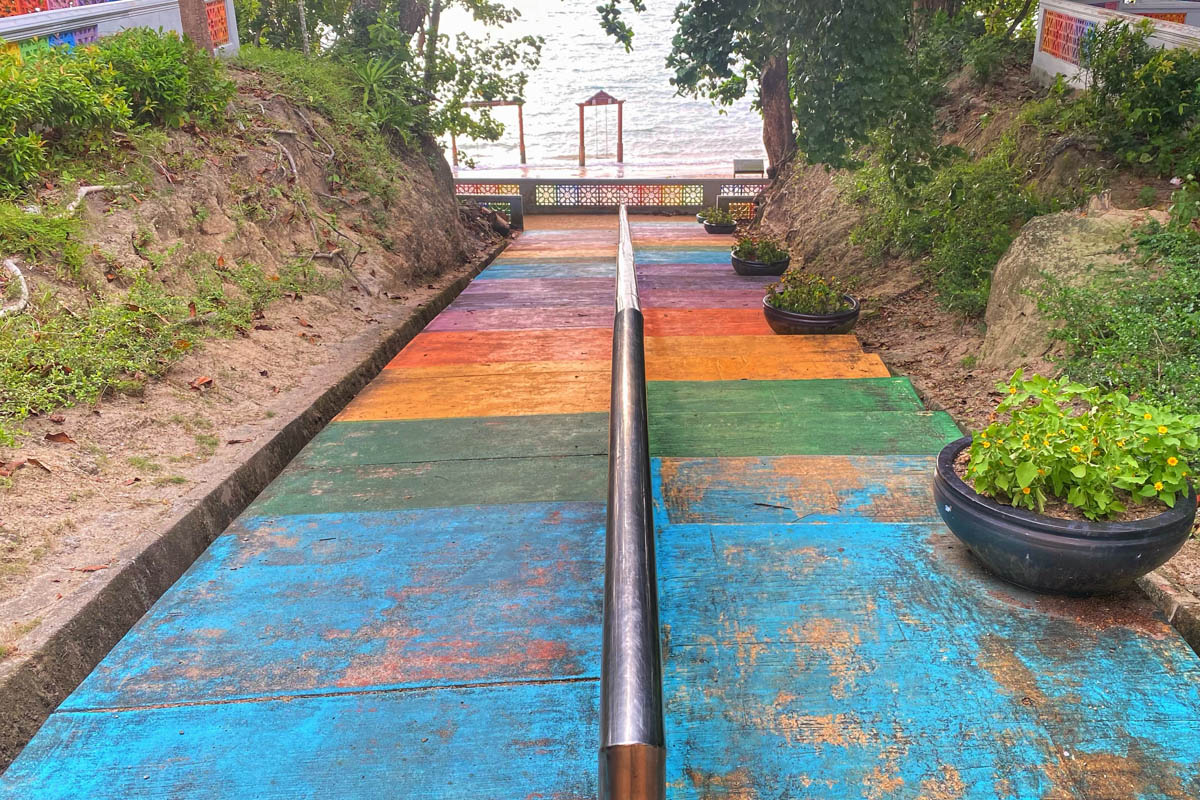 Stunning views of colorful stairs leading down to Black Sand Beach