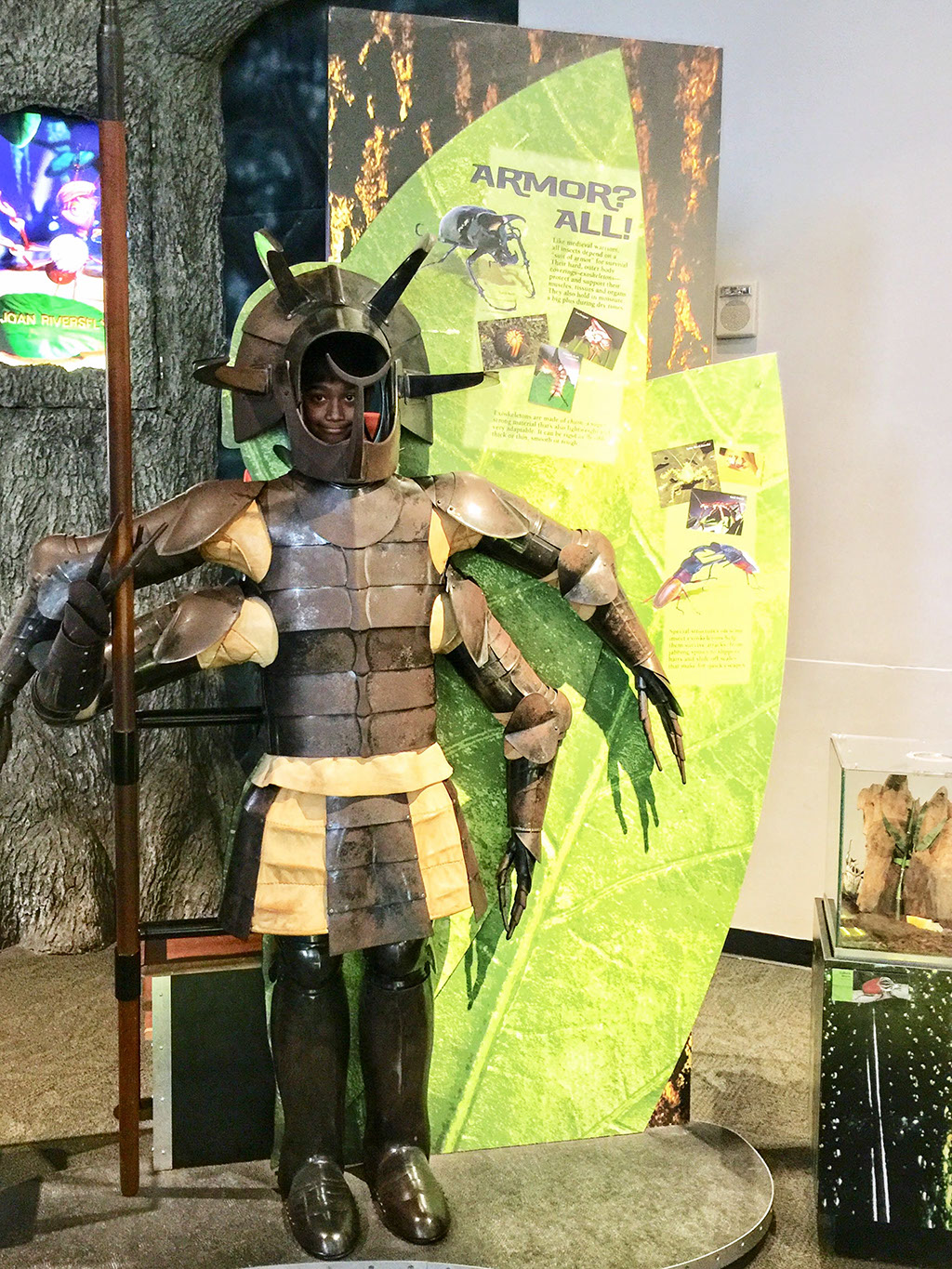 Children posing as an insect armor at Insectarium of New Orleans