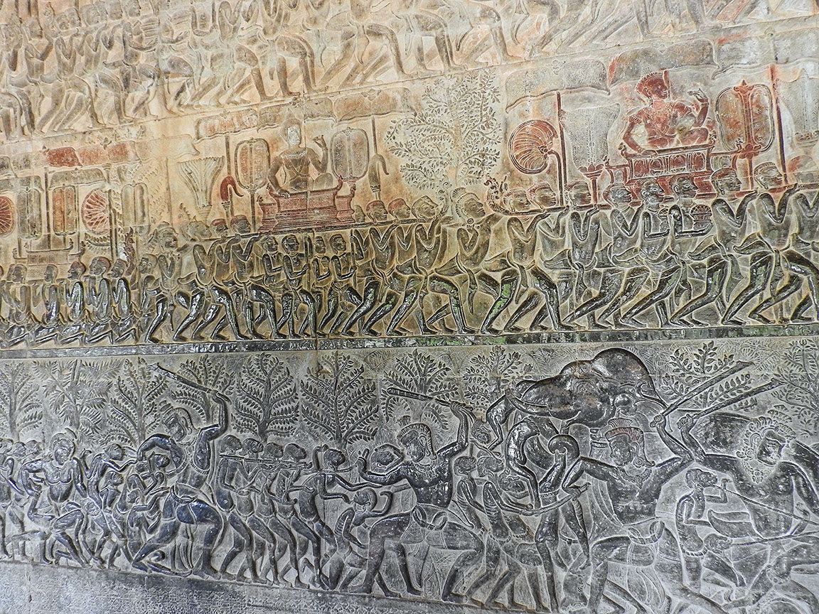Intricately carved bas relief in Angkor Wat narrates the battle of Mahabharata