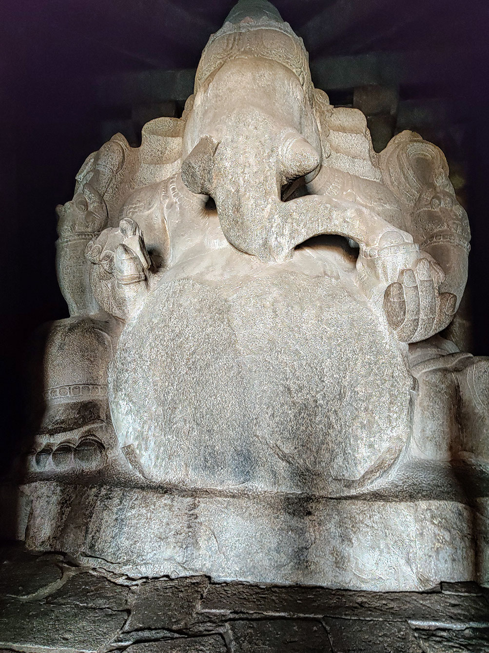 Towering statue of Lord Ganesha in Hampi