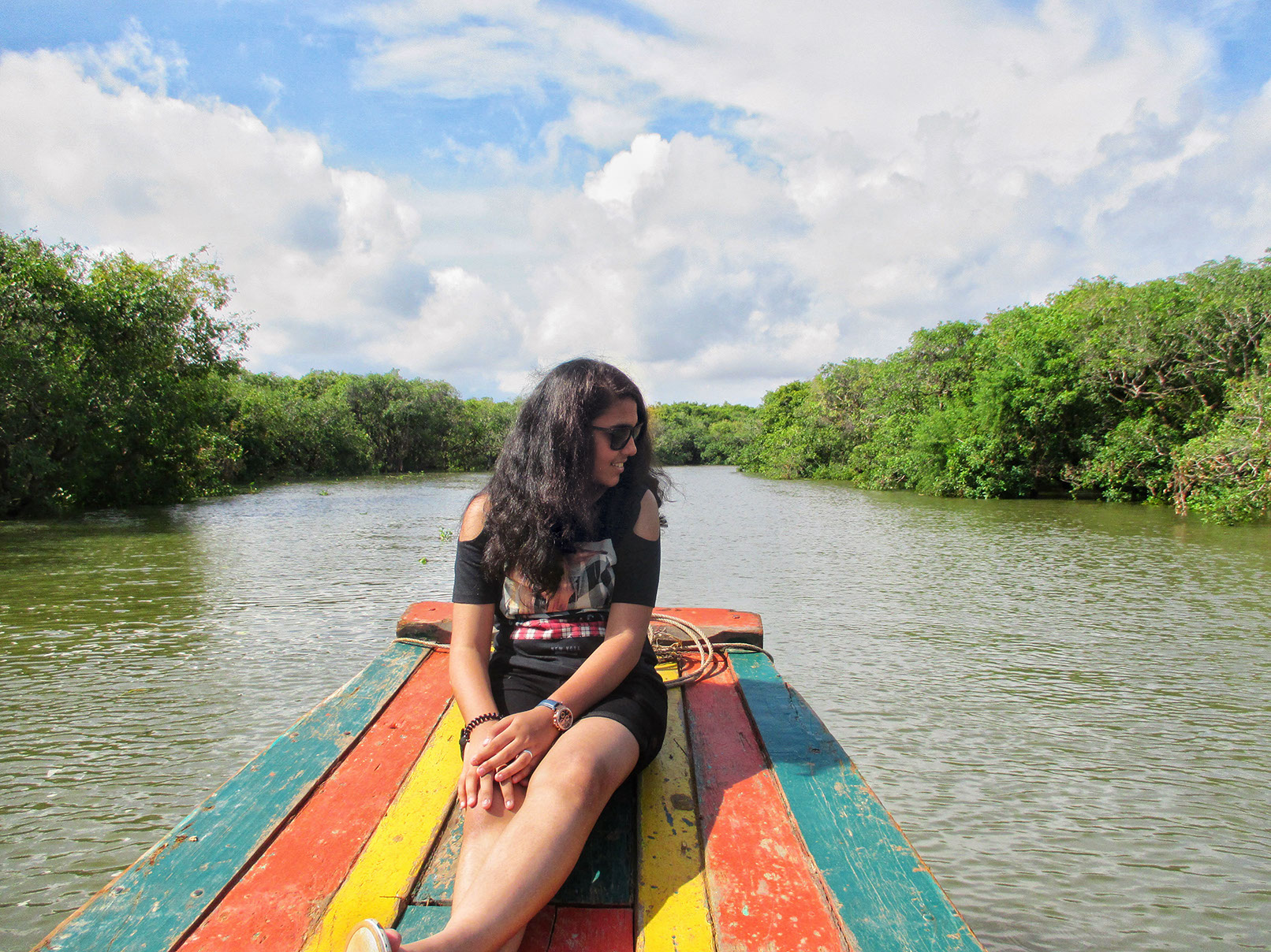 Teenager enjoying a fun photo shoot in the interior part of Tonle Sap Lake