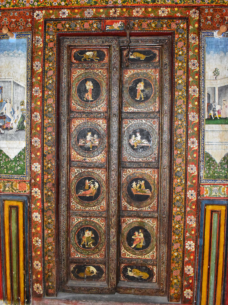 A door in the residence section of Tambekar Wada is decorated with erotic paintings