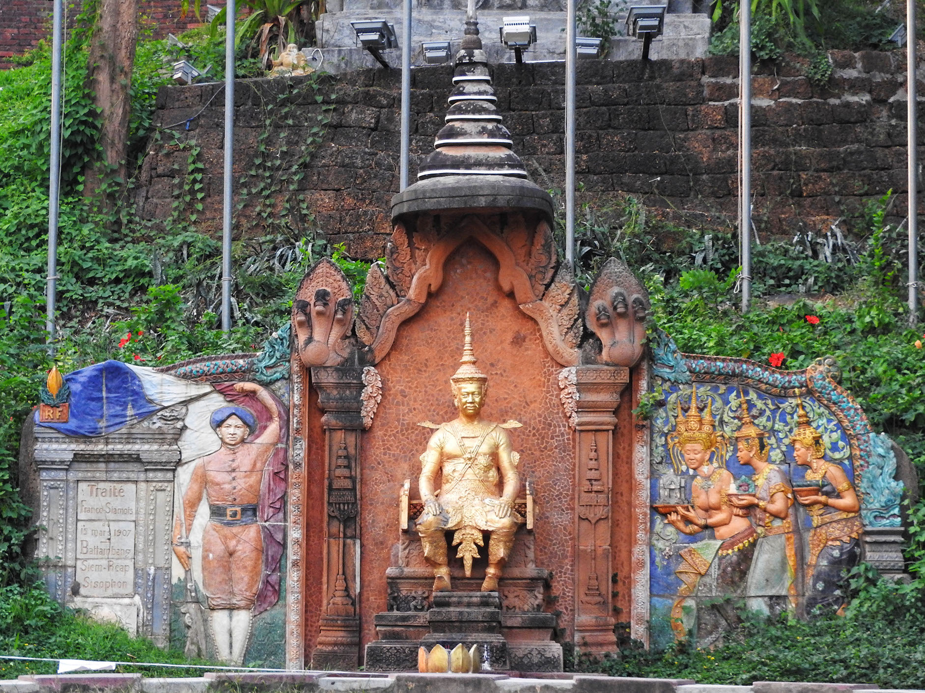 Wat Phnom's lovely garden houses a statue of the final king of the Khmer Empire, Ponhea Yat.