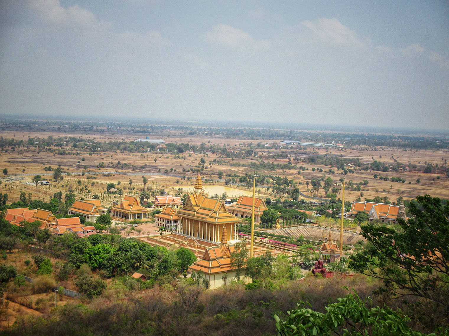 Spectacular view of the Kandal Pagoda from the top of Oudong Mountain
