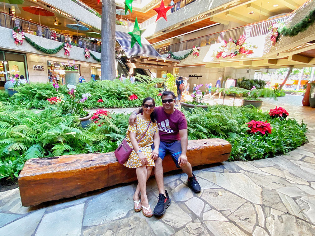 The couple enjoing Hawaii family vacation at Royal Hawaiian Shopping Center
