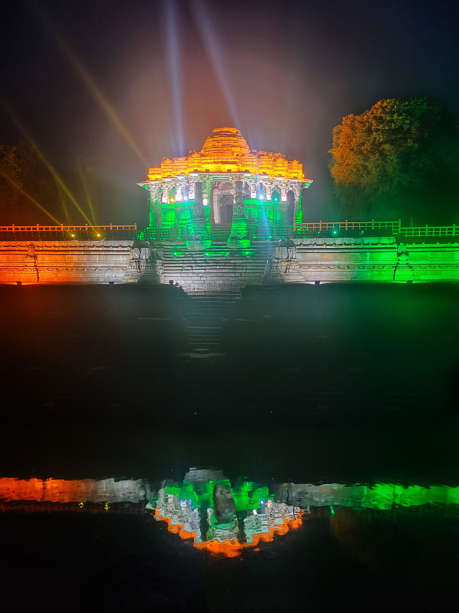 Illumination of the tri-color by and its reflection in Surya Kund at Modhera Sun Temple