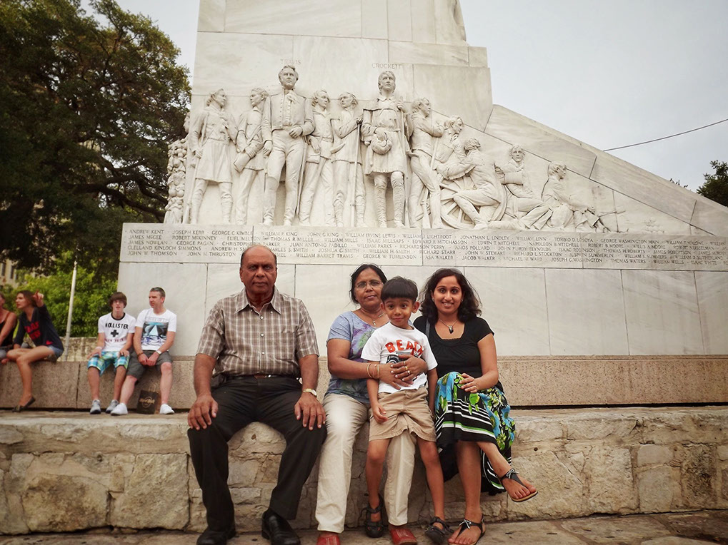 Family pose at The Alamo Cenotaph