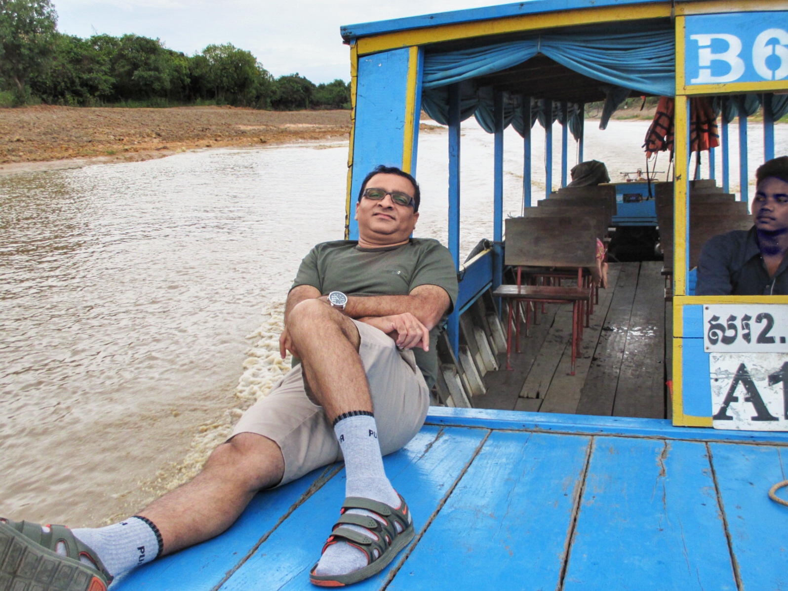 Rahuldev Rajguru unwinds on a boat cruise in the Chong Kneas waterway in Cambodia