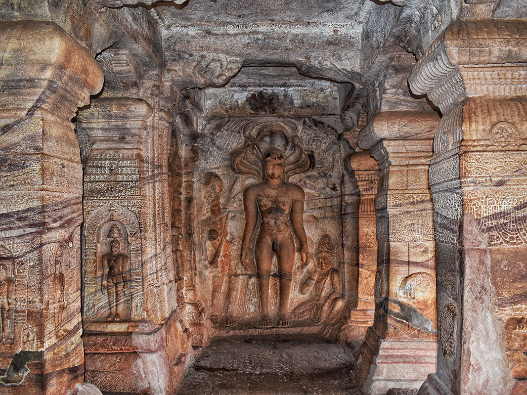 Statue of Bahubali with his two sisters inside Badami cave jain temple