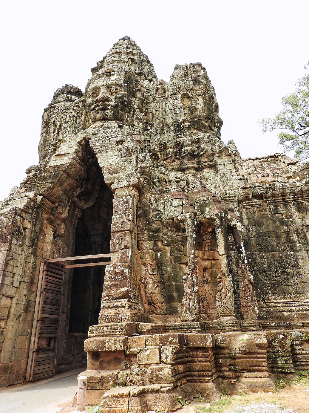 The intricate architecture of the gates at Angkor Thom during the Khmer era