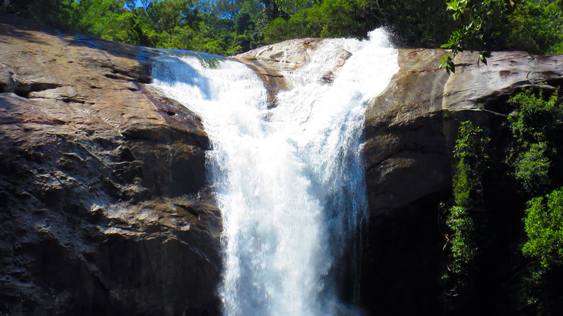 The cascaded Murray waterfalls inside tropical rainforest of Tablelands