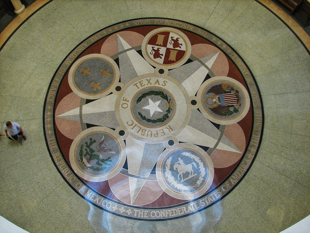 Terrazzo mosaic floor depicting Texas seal of the six nations in Austin