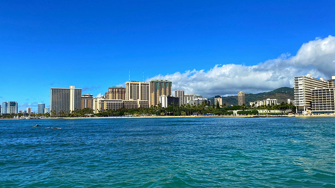 View of the Waikiki skyline showcasing the modern Waikiki island colony from Catamaran