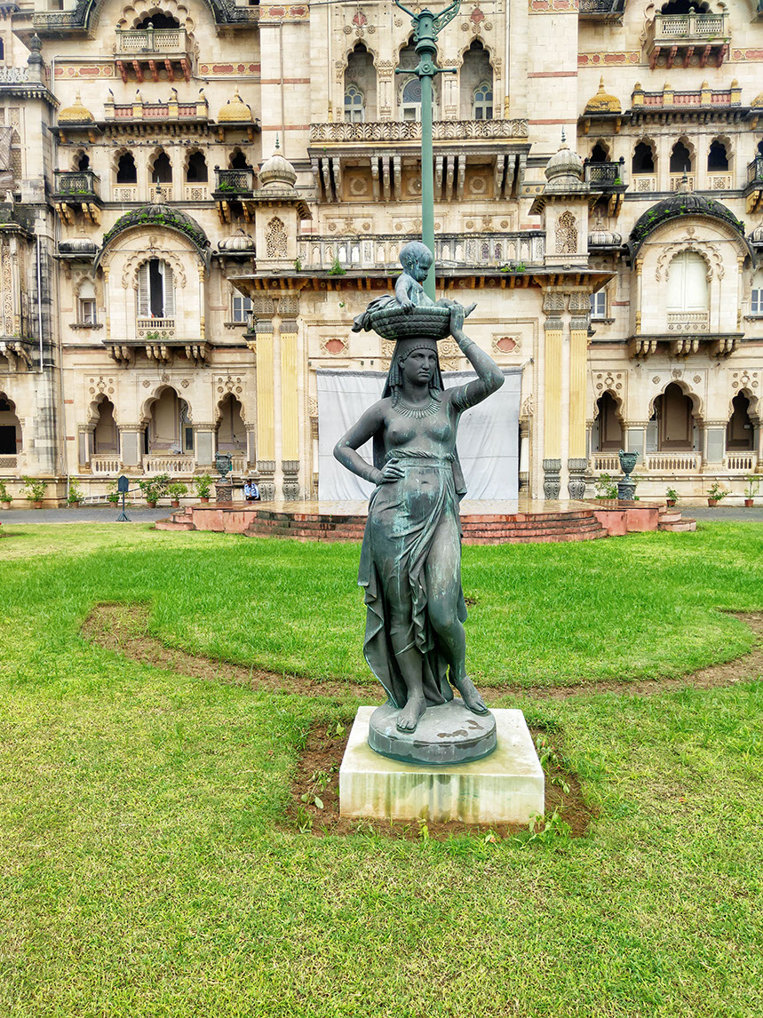 The statue of infant moses with mother Miriyam in the garden of Laxmi Vilas Palace