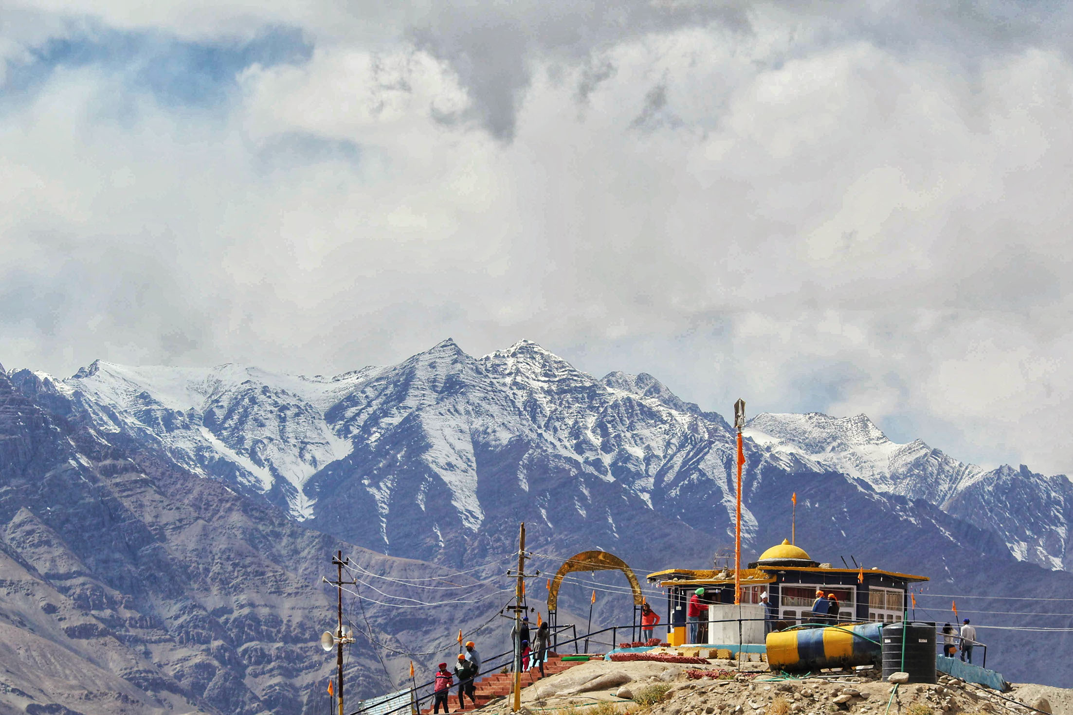 Gurudwara Shri Pathar Sahib is surrounded by the magnificent snow-covered mountains