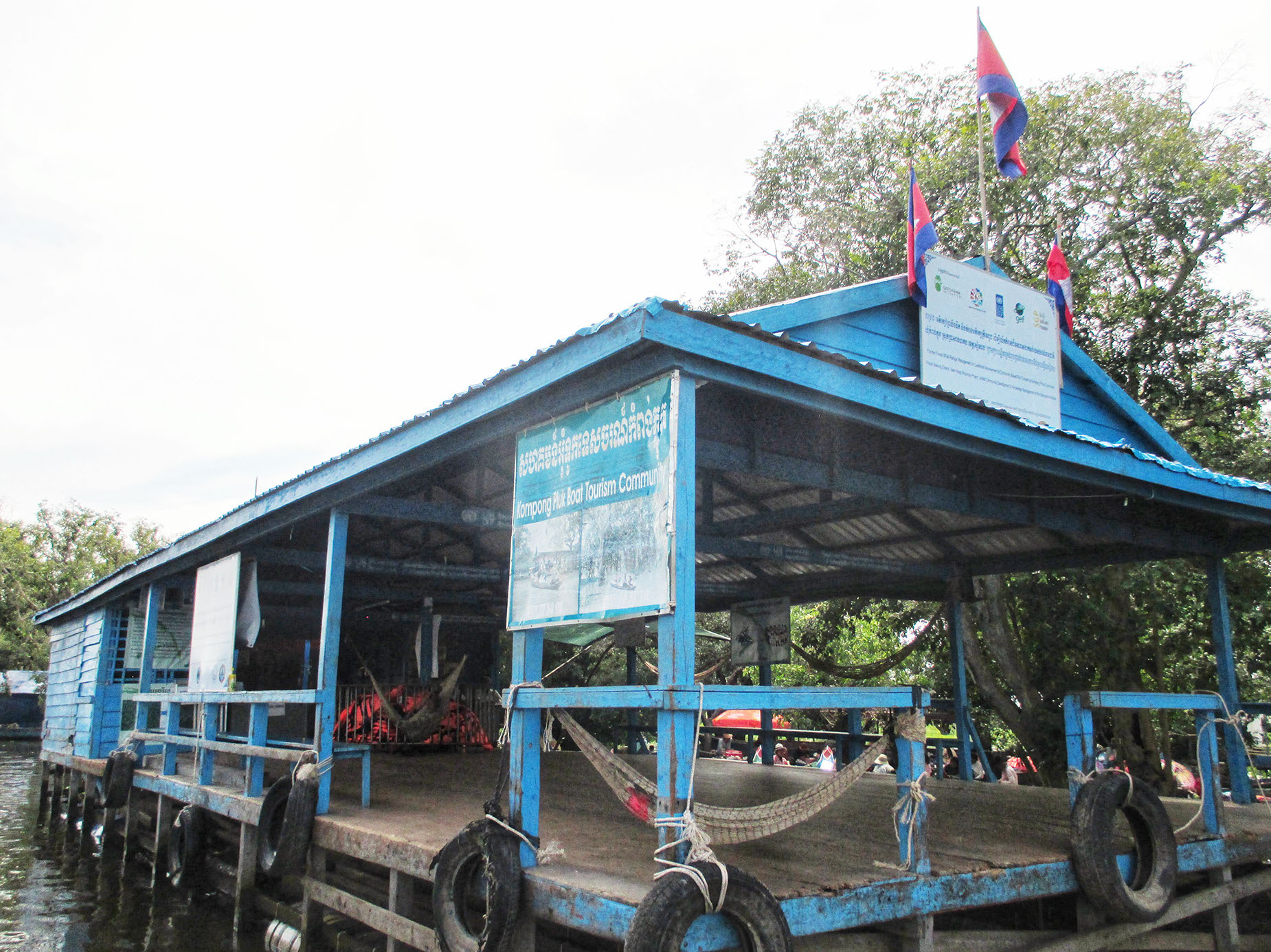 Platform to board in smaller boats to go inside the flooded forest of Cambodia