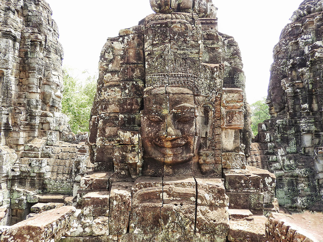 The upper terrace of the Bayon Temple with stone faces of mahayan bodhisatva avlokiteswara