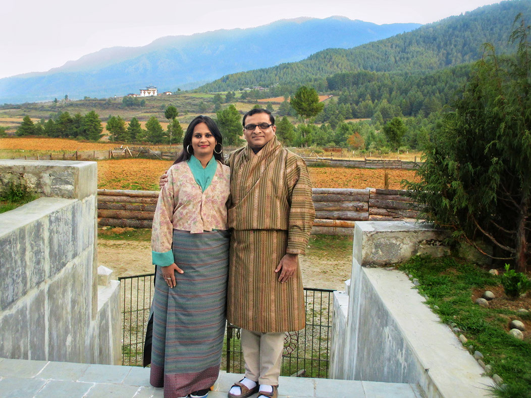 Rahuldev Rajguru and his wife in Bhutanese traditional attire at Chumey Nature Resort in Bumthang