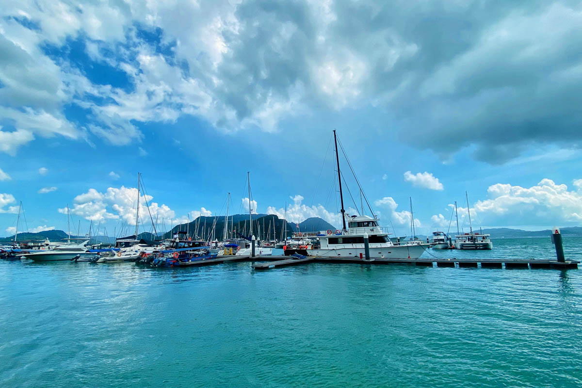 Beautiful view of Kuah jetty with boats gently swaying in the calm waters