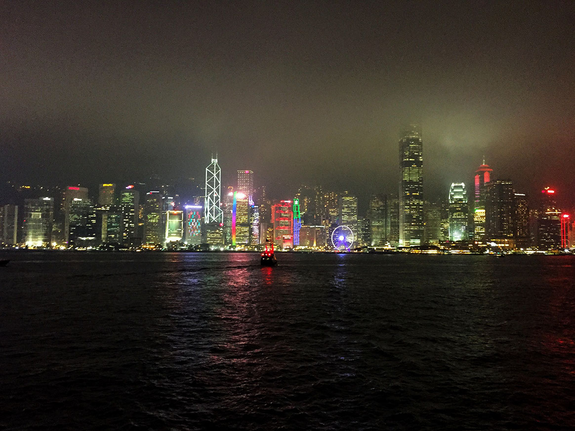 Incredible view from Kowloon of laser beams lighting up Hong Kong Island's skyscrapers